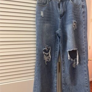 Distressed Blue Jeans